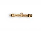 a brass plated screw with two screws on a white background