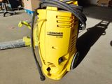 a yellow machine that is sitting on the ground
