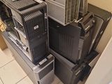 a pile of computer equipment sitting on top of each other