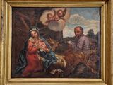 tableau représentant la Nativité de Jésus avec des anges et des moutons