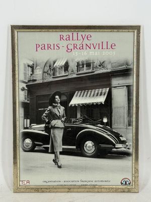 a picture of a picture of a woman standing in front of a car