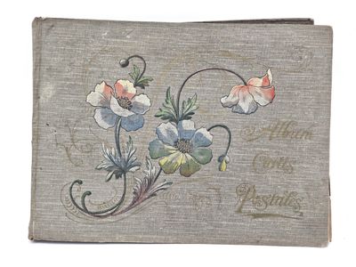 an old book with a picture of flowers on it