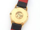 an image of a close up of a wrist watch on a white surface