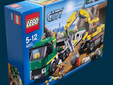 a box of lego city construction set on a blue background