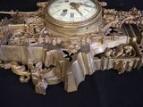 a clock that is sitting on top of a table
