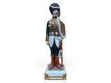 figurine représentant un soldat en uniforme, muni d'une épée