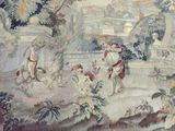 a tapestry with a picture of a man and a dog