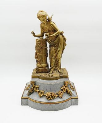 an image of a statue of a woman pouring water from a fountain
