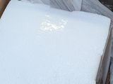 a box with a lot of white items in it