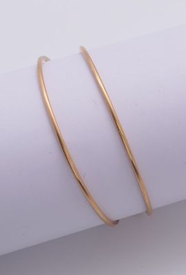 2 bracelets joncs en or jaune 750. - Photo 1