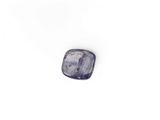 a close up of a piece of glass on a white surface