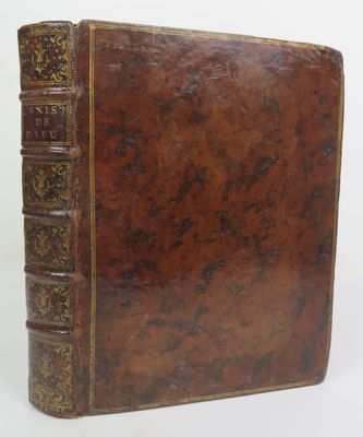 an old leather book with gold trimmings on a white background