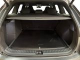 the back of a car with its trunk open showing the cargo area