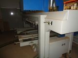an image of a machine that is working on a piece of paper