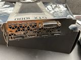 a picture of a close up of a video card in a box