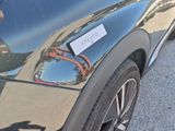 a close up of a car with a sticker on it