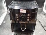a coffee machine that is sitting on a table