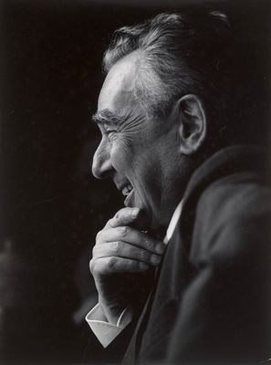 an old black and white photo of a man with his chin resting on his hand