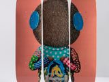 a skateboard with a picture of a teddy bear on it