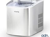Gros plan sur une petite machine à glaçons sur fond blanc