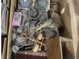 a box full of assorted items sitting on top of a table