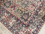 a rug on the floor with a cat laying on it