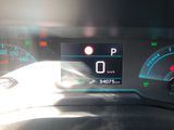 the dashboard of a car with a digital display on it