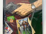 the cover of a comic book with a picture of a man holding a gun