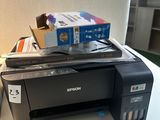 a printer that is sitting on top of a table