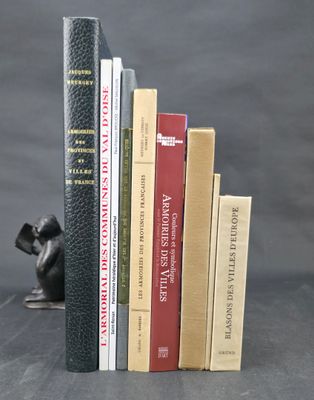 many books that are stacked on top of each other