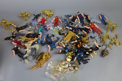 a lot of toy figurines that are on a table