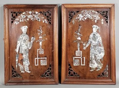 pair of chinese carved wood panels with figures and flowers