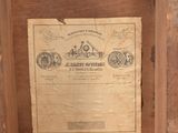 a picture of a wooden box with a label on it