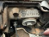a close up of a motorcycle engine with wires attached
