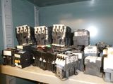 many different types of electrical equipment on a table