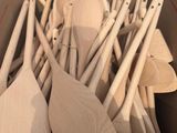a box full of wooden spoons and spatens in it