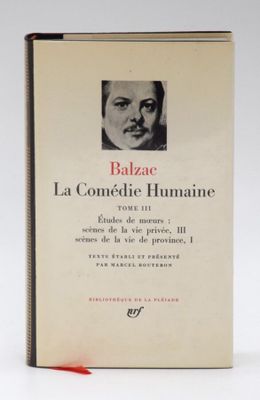 a book with a picture of a man with a mustache on it