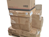 many boxes stacked on top of each other on a pallet