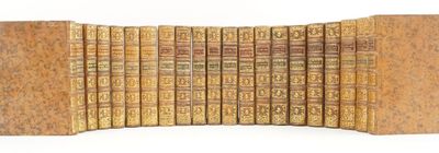 un grand nombre de livres empilés les uns sur les autres