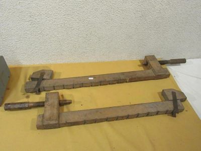 two old tools on a table with a yellow tablecloth