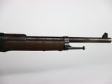 a close up of a rifle on a white background