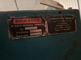 a sign on the side of a machine that says bombbed
