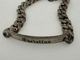 a close up of a bracelet with a name on it
