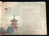 an open book with a picture of a pagoda in the background