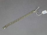 a close up of a chain with a tag attached to it