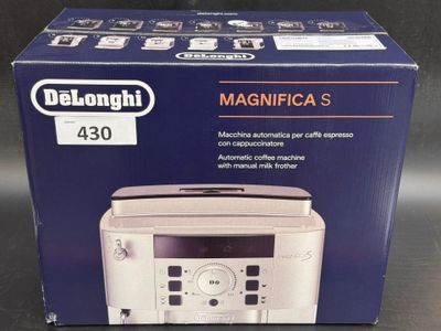 the box of the microwave is open on the table