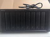 a picture of a black box with a charger on top of it