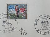 two stamps on a piece of paper with a drawing of a man and a woman on them
