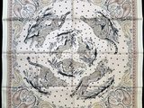a close up of a square scarf with a design of cats and birds