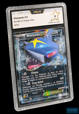 un gros plan d'une carte à collectionner Pokémon sur laquelle figure un requin